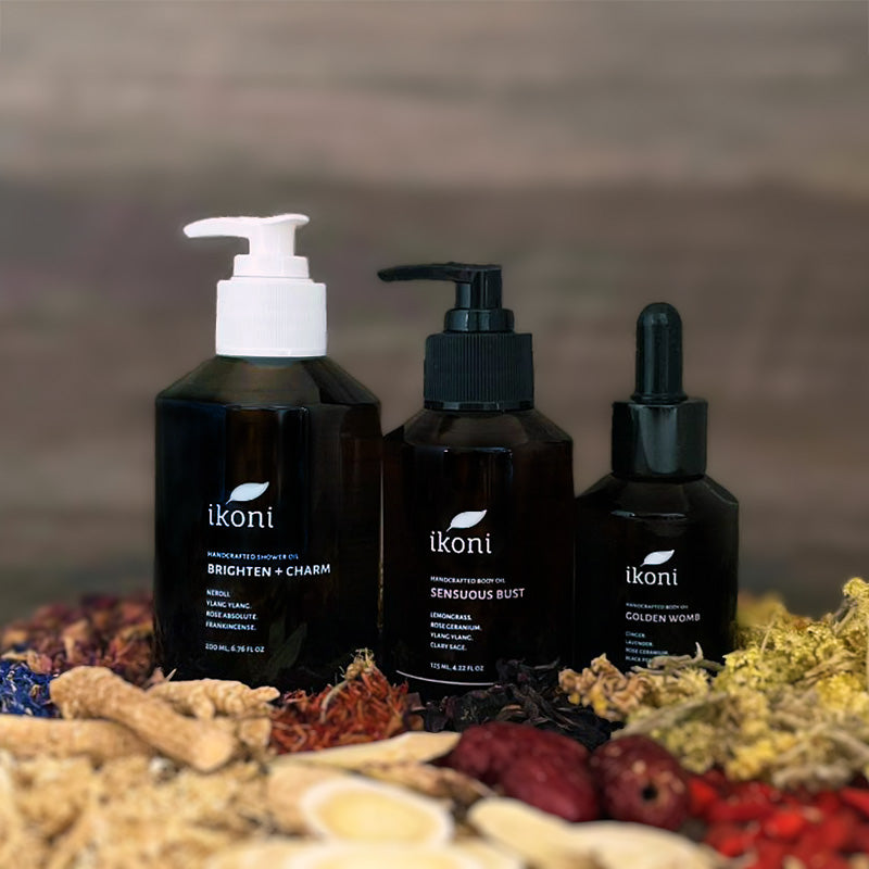 Three ikoni products on a natural background with herbs and plants.